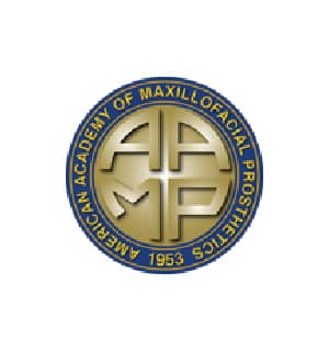 Logo featuring "American Academy of Maxillofacial Prosthetics" in blue and gold. Center design includes stylized letters "AAMP" with the founding year, 1953.
