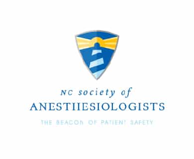 The image shows the logo of the NC Society of Anesthesiologists, featuring a lighthouse within a shield and the slogan "The Beacon of Patient Safety."